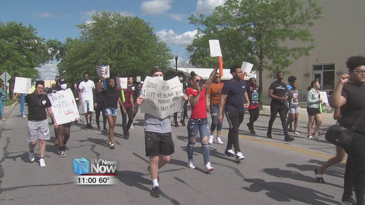 Update: Protesters chant "NO JUSTICE, NO PEACE" as they march through downtown Lima